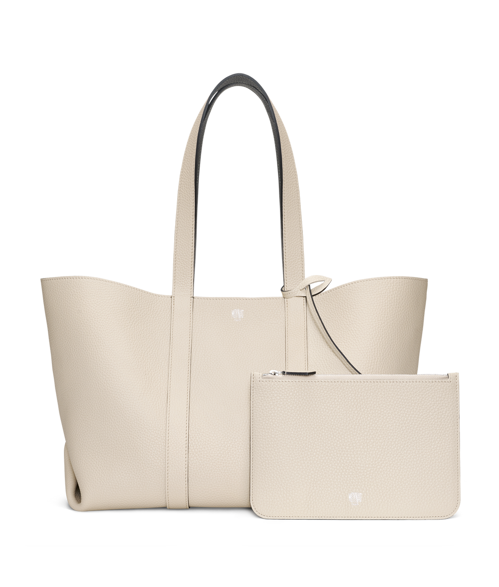 The new reversible Duo Tote from Moynat Paris. Elevate everyday excursions  with unexpected colour combinations, lightness and versatility. Discover  more, By MOYNAT